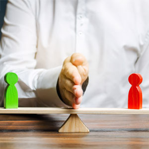 Mediator dividing two parties in dispute resolution process in California.