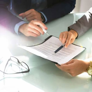 Business mediation in Rosemont, CA—professionals discussing contract terms.